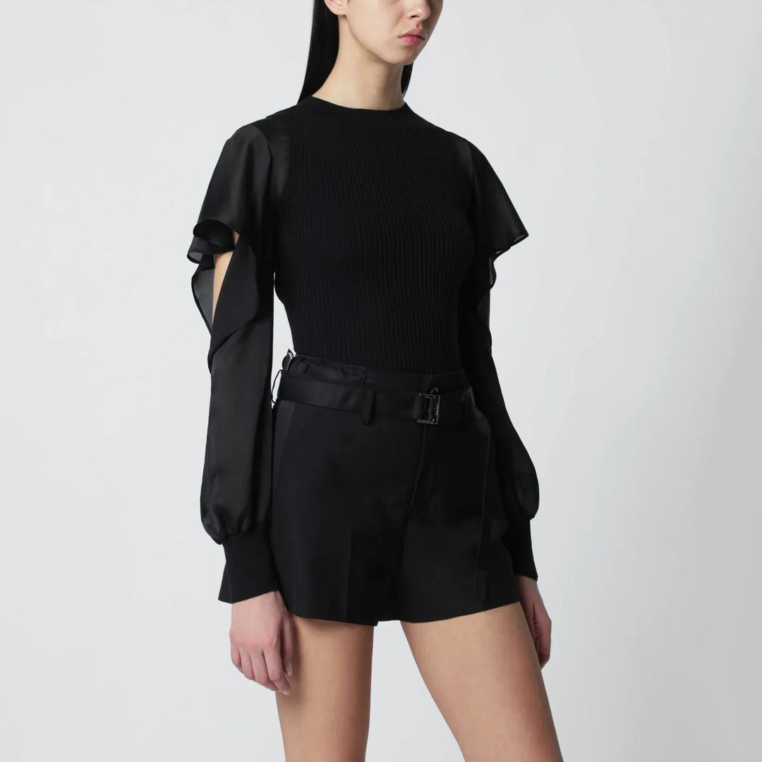 Sacai - Black knit top with semi-sheer sleeves Brand Apparel & Accessories > Clothing > Shirts & Tops 1