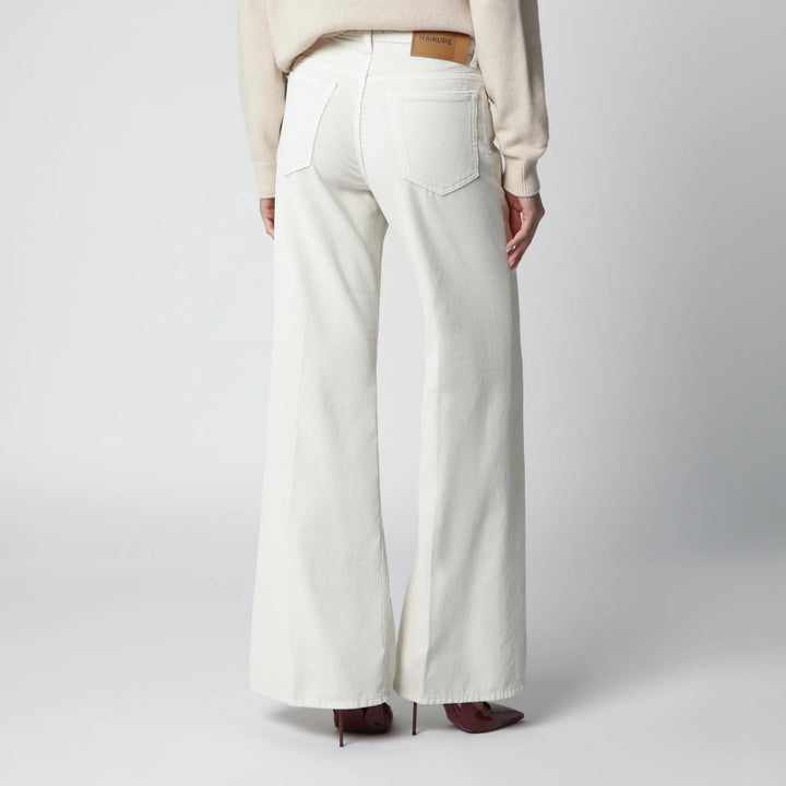 HAIKURE - Velvet cotton trousers in snow Brand