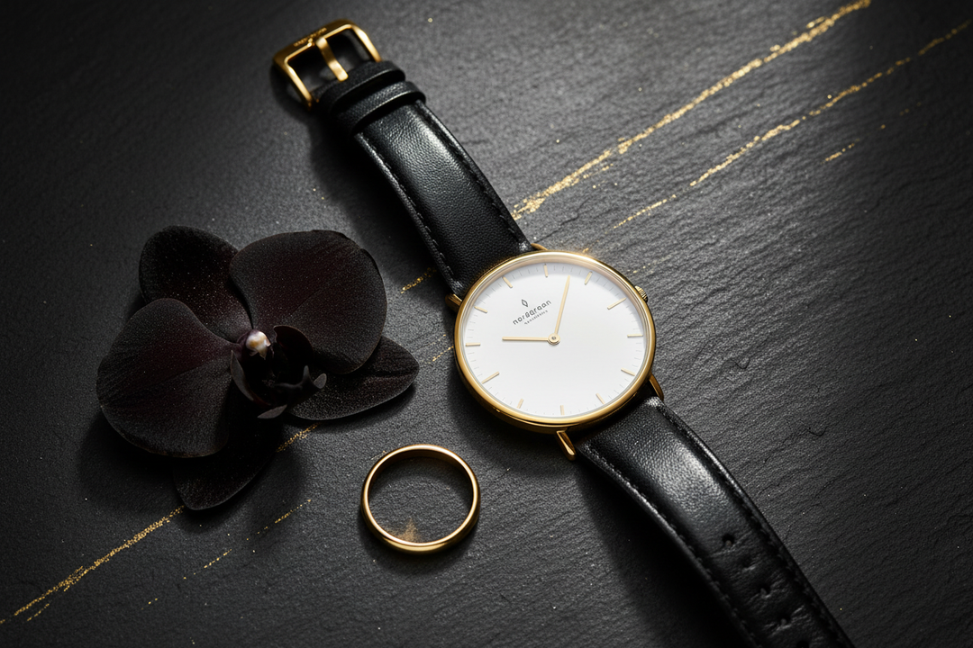 Nordgreen Native Yellow Gold Black Leather Flat Lay Lifestyle